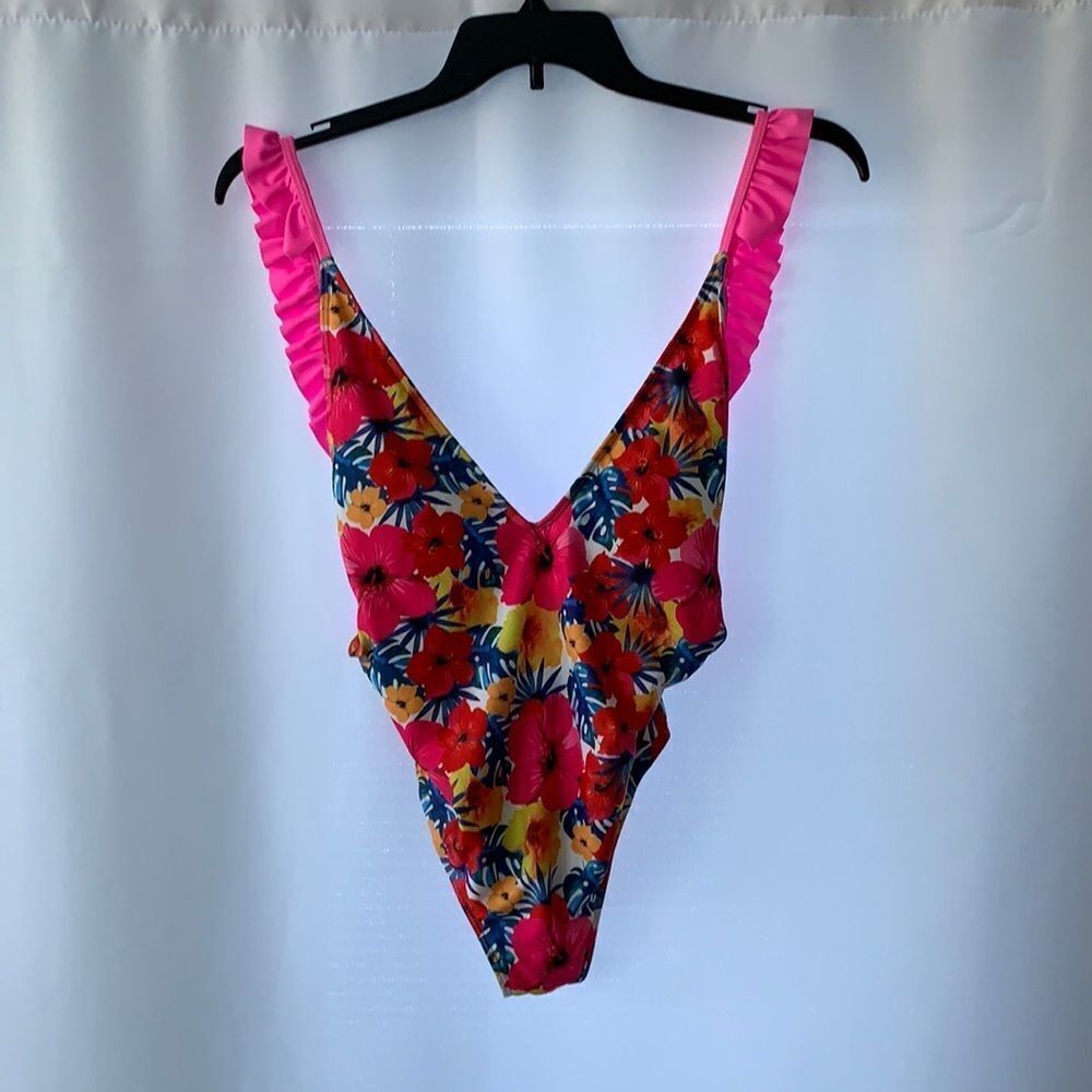 Size small pink, blue, red, yellow and white ruffle one piece swimsuit